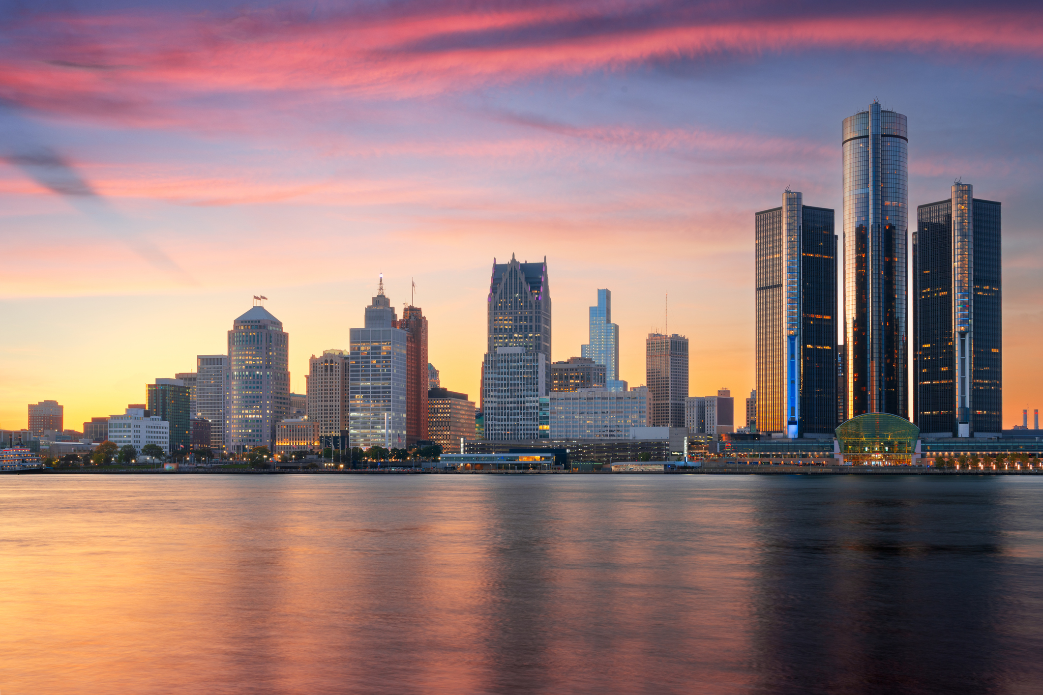 Detroit, Michigan, USA skyline at dawn on the Detroit River.